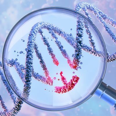 DNA double helix under a magnifying glass, symbolizing genetic engineering and gene manipulation.